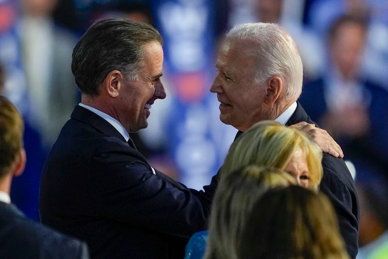 President Biden hugs his son Hunter Biden during the Democratic National Convention Monday, Aug. 19, 2024, in Chicago. (AP Photo/Matt Rourke)