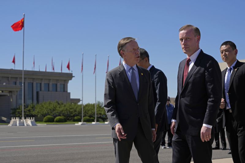 White House national security adviser Jake Sullivan, second right, walks near U.S. Ambassador to China Nicholas Burns upon arriving at the VIP terminal of the Beijing Capital International Airport in Beijing, Tuesday, Aug. 27, 2024. (AP Photo/Ng Han Guan Pool)