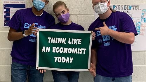 Sandy Creek High’s Economics Challenge team of Thaddeus Lewis, Molly Pate, and Colin Potts won the state championship in the National Economics Challenge.