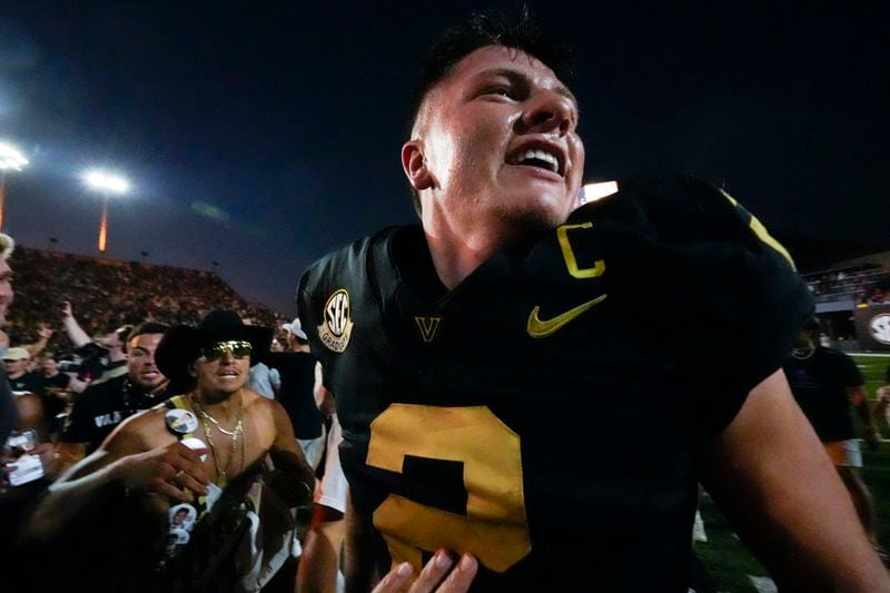 Vanderbilt quarterback Diego Pavia (2) celebrates the team's 40-35 win against Alabama after an NCAA college football game Saturday, Oct. 5, 2024, in Nashville, Tenn. (AP Photo/George Walker IV)