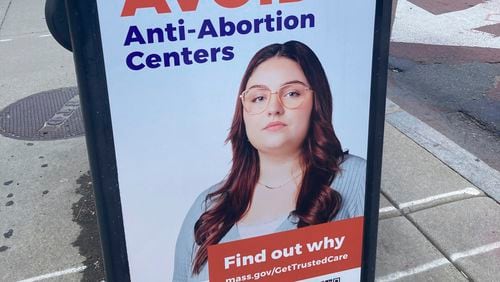 A sign deterring people from going to "anti-abortion centers" is shown in Boston on July 17, 2024. (AP Photo/Steve LeBlanc)