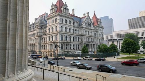 FILE - The New York state Capitol is seen from the steps of the State Education Building in Albany, N.Y., Wednesday, June 7, 2023. (AP Photo/Hans Pennink, File)