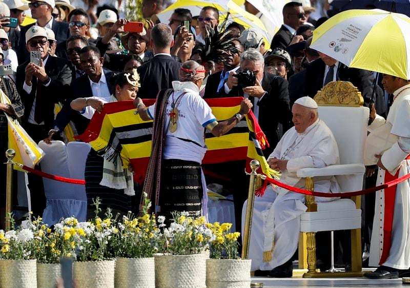 Pope Francis is welcomed on the day of the Holy Mass at the Esplanade of Taci Tolu during his apostolic trip to Asia in Dili, East Timor, Tuesday, Sept. 10, 2024. (Willy Kurniawan/Pool Photo via AP)