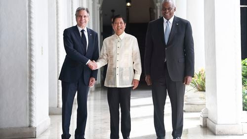 Philippine President Ferdinand Marcos Jr., center, greets U.S. Secretary of State Antony Blinken, left, and U.S. Secretary of Defense Lloyd Austin at the Malacanang presidential palace in Manila, Philippines on Tuesday, July 30, 2024. (AP Photo/Basilio Sepe, Pool)