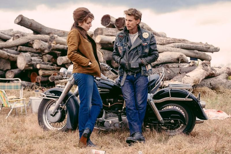 This image released by Focus Features shows Jodie Comer, left, and Austin Butler in a scene from "The Bikeriders." (Focus Features via AP)