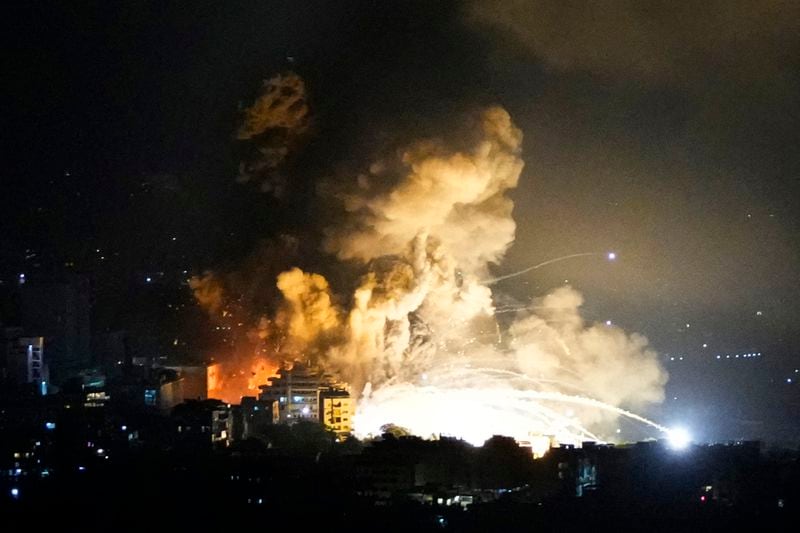 Smoke rises from Israeli airstrikes in Beirut's southern suburbs, Lebanon, Saturday, Sept. 28, 2024. (AP Photo/Hassan Ammar)