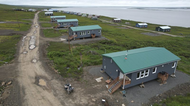 Homes of people who relocated from Newtok, Alaska are visible in Mertarvik, Alaska on Tuesday, Aug. 13, 2024. (AP Photo/Rick Bowmer)