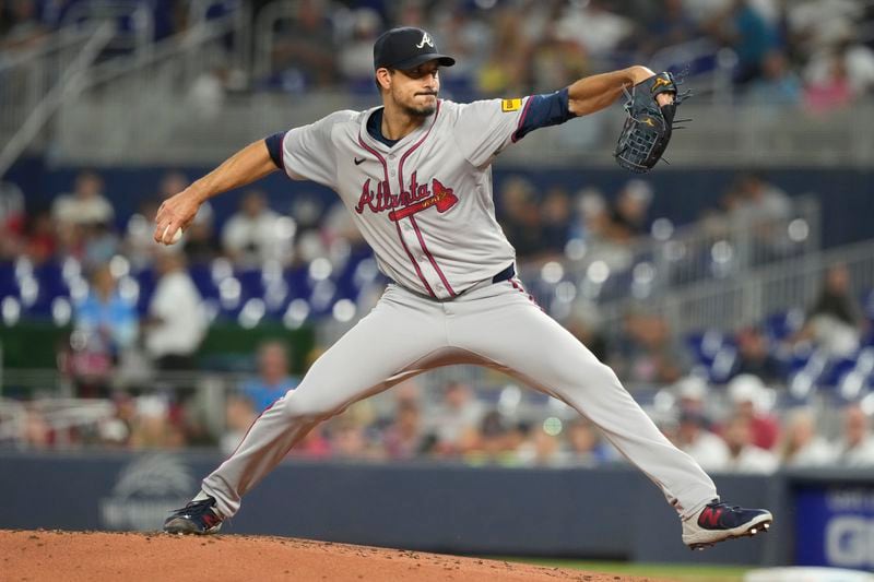 Atlanta Braves pitcher Charlie Morton (50) aims a pitch during the first inning of a baseball game against the Miami Marlins, Friday, Sept. 20, 2024, in Miami. (AP Photo/Marta Lavandier)