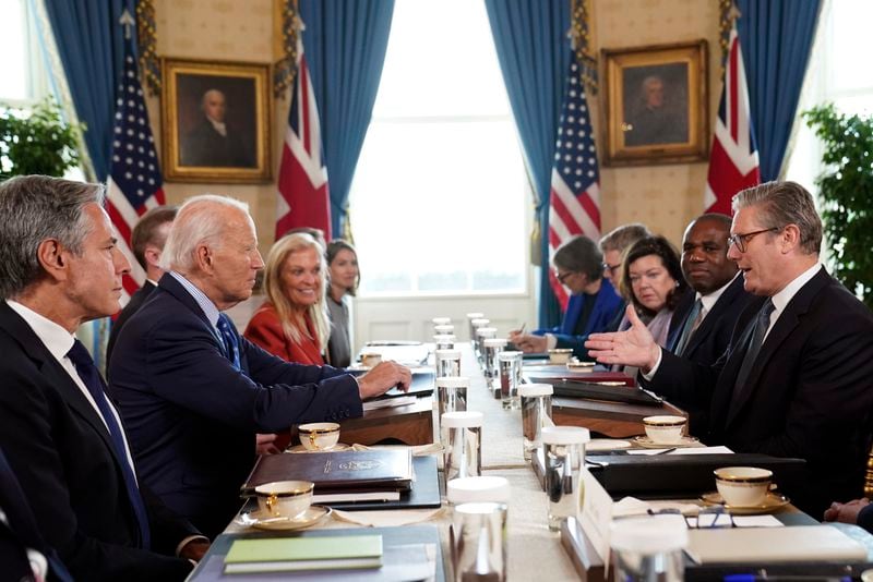 Britain's Prime Minister Keir Starmer, right, and Foreign Secretary David Lammy, second right, during a meeting with US President Joe Biden, centre left, in the Blue Room at the White House in Washington, Friday Sept. 13, 2024. (Stefan Rousseau/Pool via AP)