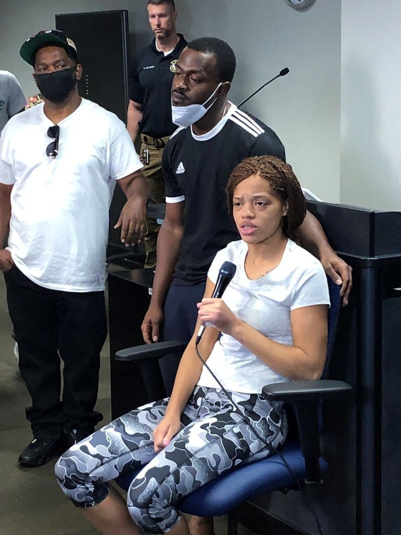 Charmaine Turner, right, and Secoriya Williamson, center, the parents o 8-year-old Secoriea Turner speak to the media at Atlanta police headquarters. Secoriea was shot and killed Saturday night, police said, by at least two individuals who fired into the car the girl was riding in in southeast Atlanta. J. SCOTT TRUBEY/SCOTT.TRUBEY@AJC.COM