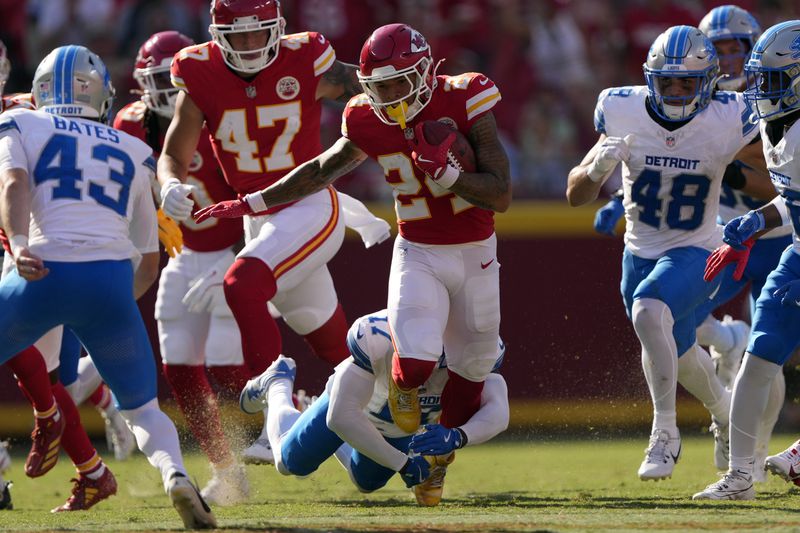 Kansas City Chiefs wide receiver Skyy Moore (24) is tackled by Detroit Lions cornerback Essang Bassey (17) as he returns kickoff during the second half of an NFL preseason football game Saturday, Aug. 17, 2024, in Kansas City, Mo. (AP Photo/Charlie Riedel)