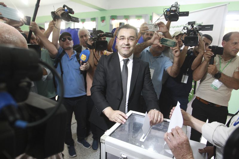 Presidential candidate and leader of the FFS party, Youcef Aouchich, casts his ballot inside a polling station during the presidential elections, Saturday, Sept. 7, 2024, in Tizi Ouzou, Algeria. (AP Photo)