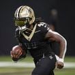 New Orleans Saints running back Alvin Kamara (41) before an NFL football game in New Orleans, Sunday, Sept. 22, 2024. The Eagles won 15-12. (AP Photo/Gerald Herbert)