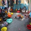 Families displaced by gang violence do laundry inside a school where they have been taking refuge for over a year in Port-au-Prince, Haiti, Friday, Sept. 20, 2024. (AP Photo/Odelyn Joseph)