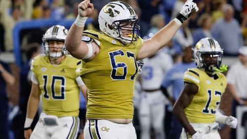 Georgia Tech Yellow Jackets offensive lineman Joe Fusile (67) celebrates their go-ahead touchdown during the fourth quarter against North Carolina on Saturday, Oct. 28, 2023. Tech won 46-42.  (Bob Andres for The Atlanta Journal-Constitution)