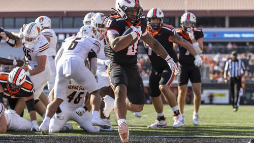 Oregon State running back Anthony Hankerson (0) finds the end zone for a touchdown during an NCAA college football game against Idaho State in Corvallis, Ore., Saturday, Aug. 31, 2024. (Sean Meagher/The Oregonian via AP)