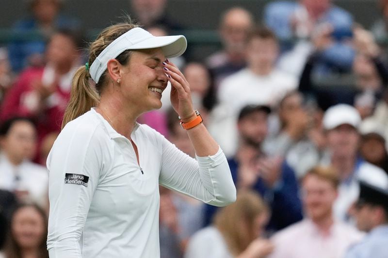 Donna Vekic of Croatia reacts after defeating Lulu Sun of New Zealand in their quarterfinal match at the Wimbledon tennis championships in London, Tuesday, July 9, 2024. (AP Photo/Mosa'ab Elshamy)