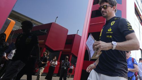 Ferrari driver Charles Leclerc of Monaco walks in the paddock at the Monza racetrack, in Monza, Italy, Thursday, Aug.29, 2024. The Formula one race will be held on Sunday. (AP Photo/Luca Bruno)