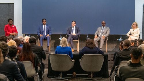 Atlanta mayoral candidates (from left) Felicia Moore, Andre Dickens, Antonio Brown, Kasim Reed and Sharon Gay participate in a debate earlier this month. (Hyosub Shin / Hyosub.Shin@ajc.com)