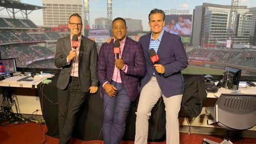 Brian Jordan (center) with Nick Green (left) and Chip Caray (right) in the broadcast booth at Truist Park earlier this season. (Bally Sports photo)