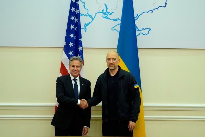 U.S. Secretary of State Antony Blinken shakes hands with Ukraine's Prime Minister Denys Shmyhal at the Cabinet of Ministers in Kyiv, Ukraine, Wednesday, Sept. 11, 2024. (AP Photo/Mark Schiefelbein, Pool)