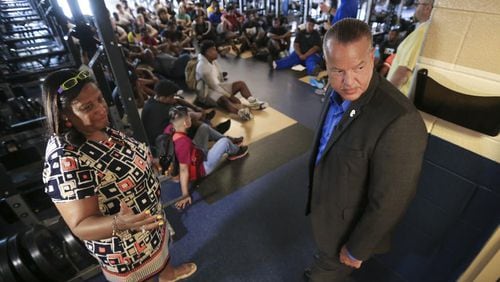 Cobb County School District Superintendent Chris Ragsdale, front right, said AlertPoint will enable every school official to have their own alert device to instantly issue 911 warnings to first responders and trigger a Code Red lockdown throughout the school. AJC file photo