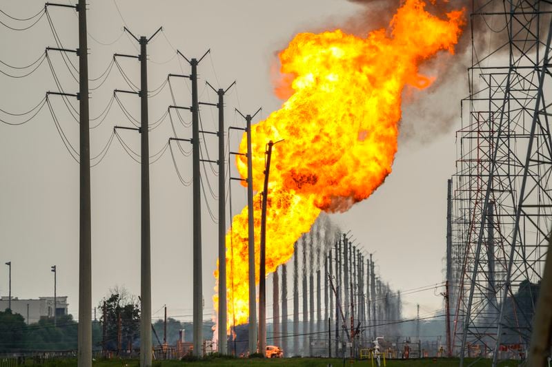 A pipeline carrying liquified natural gas burns near Spencer Highway and Summerton on Monday, Sept. 16, 2024, in La Porte, Texas. (Brett Coomer/Houston Chronicle via AP)