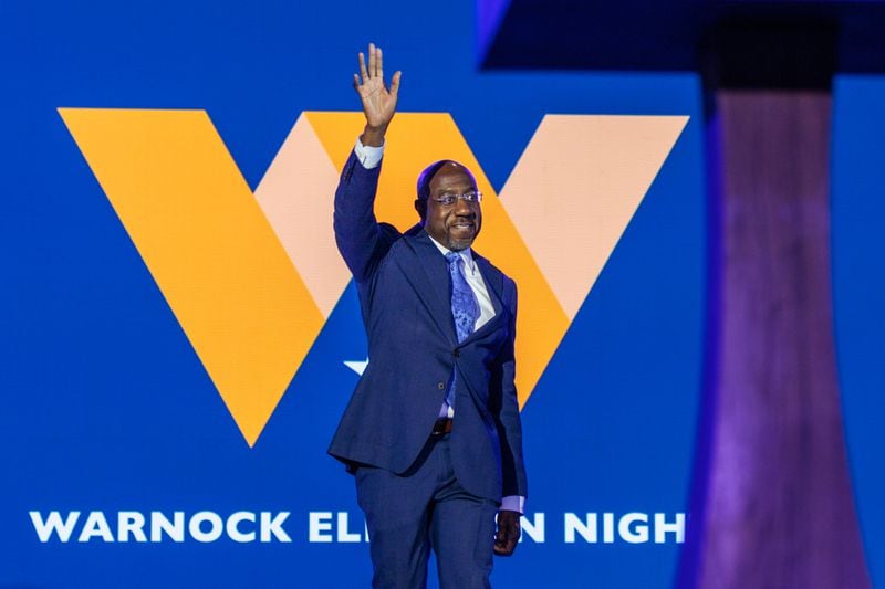 U.S. Sen. Raphael Warnock walks on stage to address supporters at his election night watch party at the Atlanta Marriott Marquis in Atlanta on Tuesday, November 8, 2022. (Arvin Temkar / arvin.temkar@ajc.com)