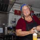 Beth Shipman poses for a photo in the On-Deck Diner kitchen on July 23, 2024 in Daufuskie Island, South Carolina. (AJC Photo/Katelyn Myrick)