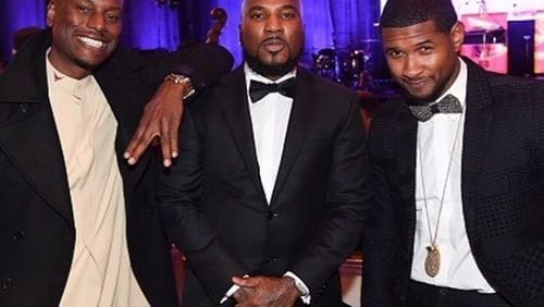 Atlanta rapper Young Jeezy, in the center in this January 2017 photo at the 33rd annual UNCF Atlanta Mayor’s Masked Ball, has been accused in a recent civil lawsuit of blowing off a concert to go to a party, but keeping the promoter’s money. He is flanked by Tyrese Gibson on the left and Usher on the right. Photo: Quinn Hood, Case Love Productions /Larche’ Communications LLC