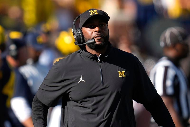 Michigan head coach Sherrone Moore watches against Southern California in the first half of an NCAA college football game in Ann Arbor, Mich., Saturday, Sept. 21, 2024. (AP Photo/Paul Sancya)