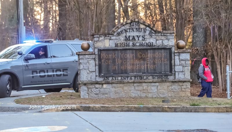 Four Benjamin E. Mays High School students suffered non-life-threatening wounds after a Feb. 14 shooting in the school's parking lot. (John Spink / john.spink@ajc.com)