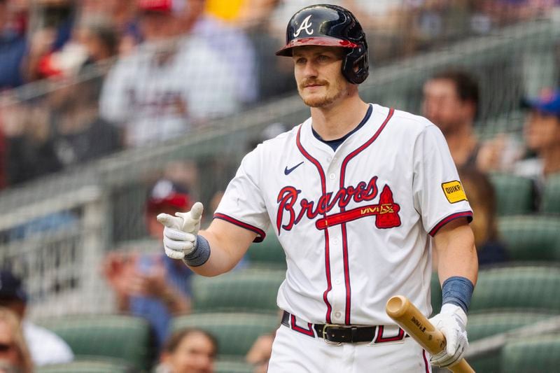 Atlanta Braves' Sean Murphy greets Jorge Soler at home plate in the second inning of the second baseball game of a doubleheader against the New York Mets, Monday, Sept. 30, 2024, in Atlanta. (AP Photo/Jason Allen)