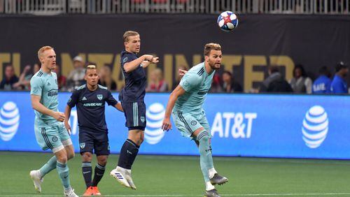 April 20, 2019 Atlanta - Atlanta United defender Leandro Gonzalez (5) heads the ball during MLS soccer match at Mercedes-Benz Stadium  in Atlanta on Wednesday, April 20, 2019. HYOSUB SHIN / HSHIN@AJC.COM