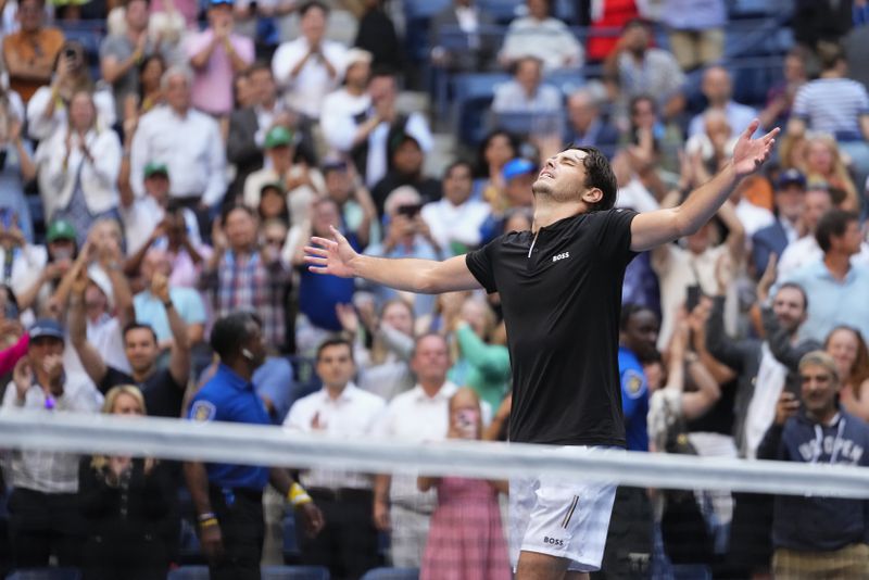 Taylor Fritz, of the United States, reacts after defeating Alexander Zverev, of Germany, during the quarterfinals of the U.S. Open tennis championships, Tuesday, Sept. 3, 2024, in New York. (AP Photo/Kirsty Wigglesworth)