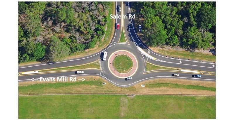 The city could create a roundabout at the intersection to make the corner safer.