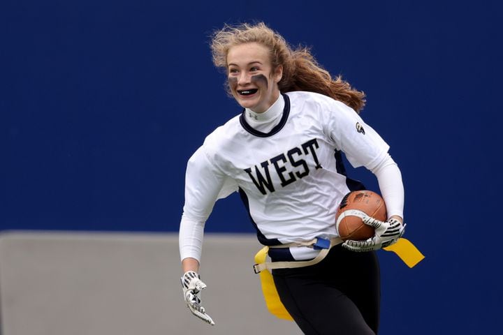 West Forsyth wide receiver Caroline Coggin scores a touchdown against Hillgrove during the first half of the Class 6A-7A Flag Football championship at Center Parc Stadium Monday, December 28, 2020 in Atlanta, Ga.. JASON GETZ FOR THE ATLANTA JOURNAL-CONSTITUTION