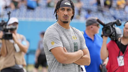 Green Bay Packers' Jordan Love watches before an NFL football game against the Tennessee Titans Sunday, Sept. 22, 2024, in Nashville, Tenn. (AP Photo/George Walker IV)