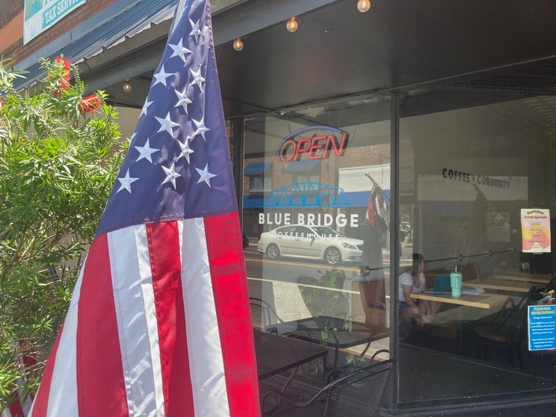 The Blue Bridge Coffeehouse on Lee Street in downtown Kingsland is a popular community gathering spot. (Adam Van Brimmer/AJC)