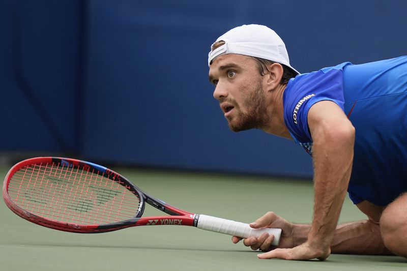 Tomas Machac, of the Czech Republic, watches after his return shot to David Goffin, of Belgium, during the third round of the U.S. Open tennis championships, Saturday, Aug. 31, 2024, in New York. (AP Photo/Julia Nikhinson)