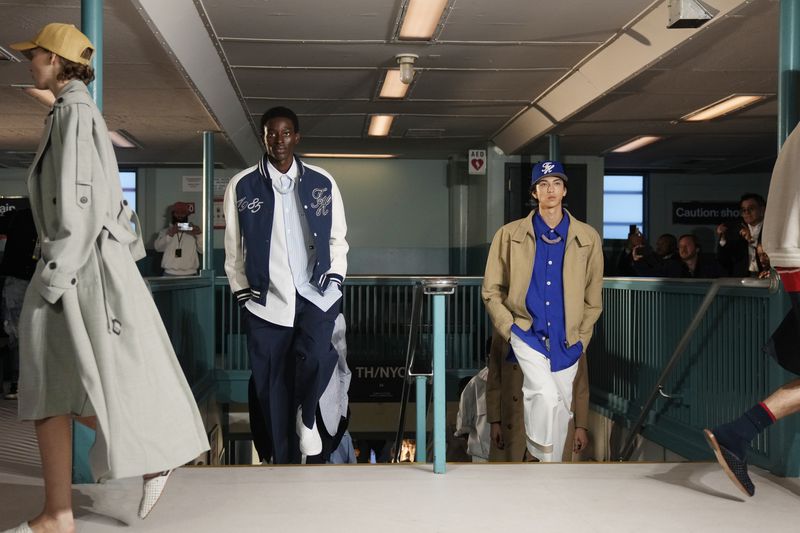 Models walk the runway during the Tommy Hilfiger Spring/Summer 2025 fashion show onboard a Staten Island Ferry as part of New York Fashion Week on Sunday, Sept. 8, 2024, in New York. (Photo by Charles Sykes/Invision/AP)