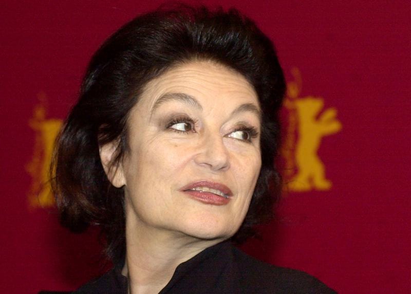 FILE - French actress Anouk Aimee is seen prior to a media conference at the 53rd Berlinale Film Festival in Berlin Thursday, Feb. 13, 2003. Later this evening she will be honored with a Golden Bear award for her lifetime achievements. French actress Anouk Aimée, winner of a Golden Globe for her starring role in "A Man and a Woman" by legendary French director Claude Lelouch, has died, her agent said Tuesday. She was 92. (AP Photo/Sven Kaestner, File)