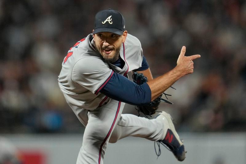 Atlanta Braves pitcher Charlie Morton follows through on a pitch that struck out San Francisco Giants' Mike Yastrzemski during the sixth inning of a baseball game in San Francisco, Tuesday, Aug. 13, 2024. (AP Photo/Jeff Chiu)