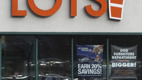 FILE - A shopper leaves the Big Lots store on Dec. 4, 2012 in Berlin, Vt. (AP Photo/Toby Talbot, file)