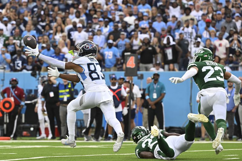 Tennessee Titans wide receiver Tyler Boyd (83) misses a catch in the second half of an NFL football game against the New York Jets in Nashville, Tenn., on Sunday, Sept. 15, 2024. (AP Photo/John Amis)