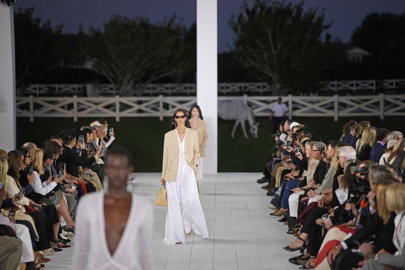 Models walks the runway during the Ralph Lauren Spring/Summer 2025 fashion show as part of New York Fashion Week on Thursday, Sept. 5, 2024, at Khalily Stables in Bridgehampton, N.Y. (Photo by Charles Sykes/Invision/AP)