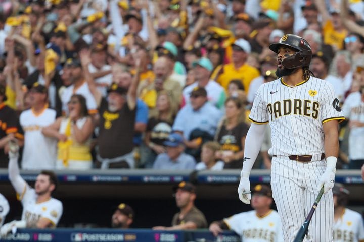 San Diego Padres’ Fernando Tatis Jr. watches a 2-RBI home run against the Atlanta Braves during the first inning of National League Division Series Wild Card Game One at Petco Park in San Diego on Tuesday, Oct. 1, 2024.   (Jason Getz / Jason.Getz@ajc.com)