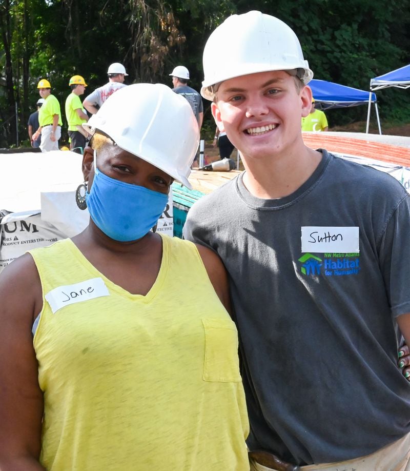 Jane Kellogg with Sutton Cadman. The Habitat home will be built for Steve Harris, a disabled Army veteran, and Kellogg, his long-time fiancee. Photo by Dolly Purvis/Habitat for Humanity of Northwest Metro Atlanta.