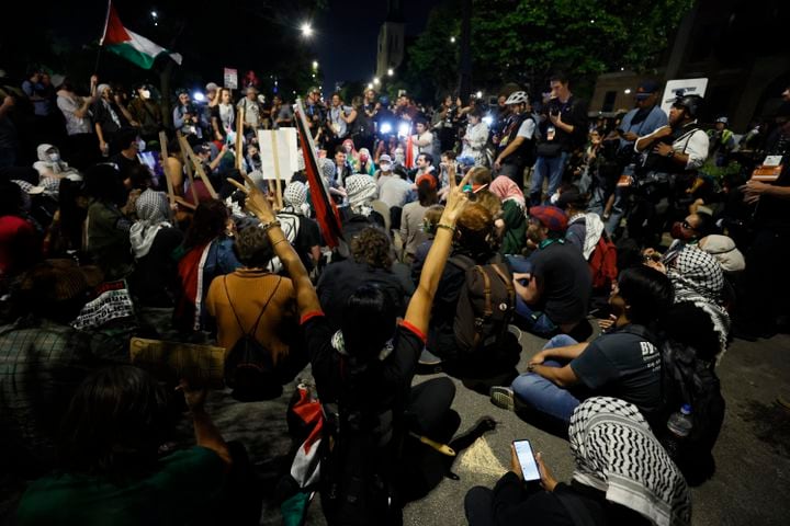 Protesters briefly clash with police.