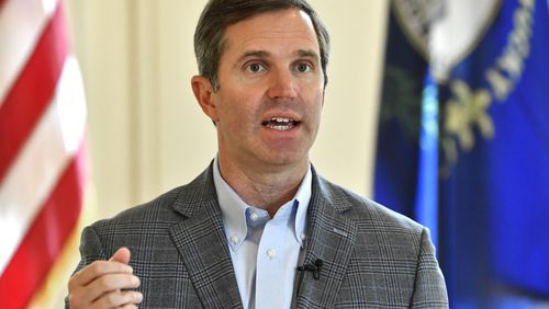 Kentucky Gov. Andy Beshear speaks during an interview at the Kentucky State Capitol in Frankfort, Ky., Monday, July 22, 2024. (AP Photo/Timothy D. Easley)